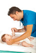 Doctor checking locomotor skills to baby