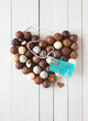 Photo: Heart made with chocolate truffles and a tag Heart made with chocolate truffles and a tag