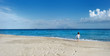 Adorable little girl on a sandy beach