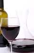 Decanter, bottle and glass of wine close-up