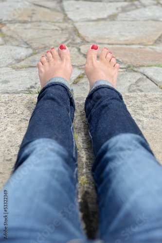 Photo: Female feet with pedicure close up Female feet with pedicure close up