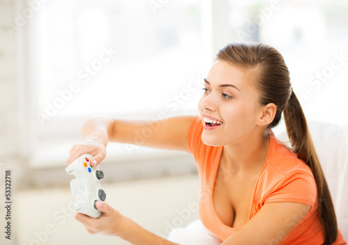 Photo: woman with joystick playing video games woman with joystick playing video games