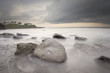 rocky beach and dark sky