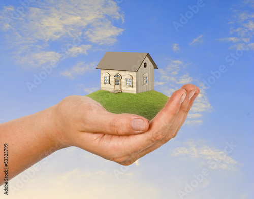 Photo: hand wth house hand wth house