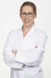 Smiling young female model posing as scientist