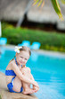 Photo: Little girl near swimming pool Little girl near swimming pool
