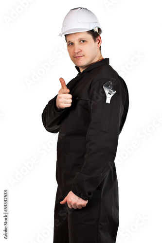 Photo: Handyman wearing uniform and hardhat Handyman wearing uniform and hardhat