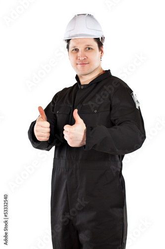 Photo: Handyman wearing uniform and hardhat Handyman wearing uniform and hardhat
