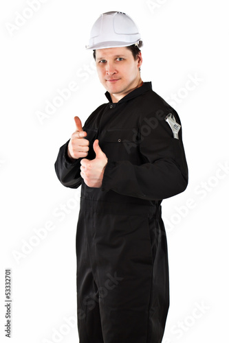 Photo: Handyman wearing uniform and hardhat Handyman wearing uniform and hardhat