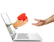 Male hand giving gift box to woman from laptop screen isolated
