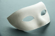 White mask, on grey background