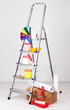 Foto: Metal ladder and paint in room Metal ladder and paint in room