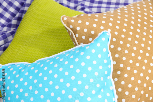 Photo: Three various pillows close-up Three various pillows close-up