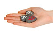 Fortune telling  with symbols on stone in hand isolated on