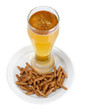 Beer in glass and croutons isolated on white