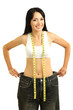 Photo: Beautiful young woman with big jeans and measuring tape Beautiful young woman with big jeans and measuring tape