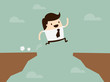 businessman jump through the gap