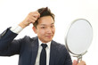 Photo: ヘアセットをするビジネスマン ヘアセットをするビジネスマン