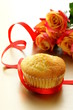 cake muffin with a bouquet of roses - sweet gift