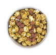 Peanuts and caramel popcorn in bowl