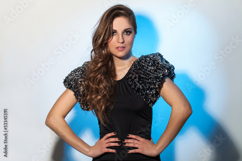 Photo: Beautiful young woman with luxury style Beautiful young woman with luxury style
