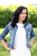 Beautiful brunette woman in casual at the park