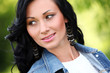 Beautiful brunette woman in casual at the park