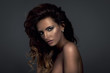 Photo: Beautiful woman with fashion shiny highlighter on skin Beautiful woman with fashion shiny highlighter on skin