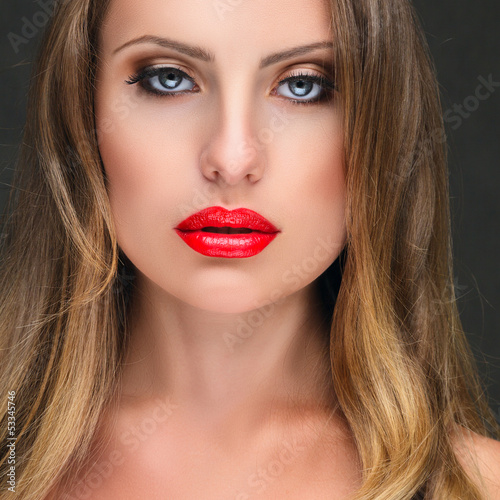 Photo: Beautiful young woman portrait Beautiful young woman portrait
