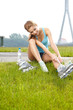 Roller skate girl skating. Young woman putting on skates going r