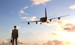 businessman looking on  airplane