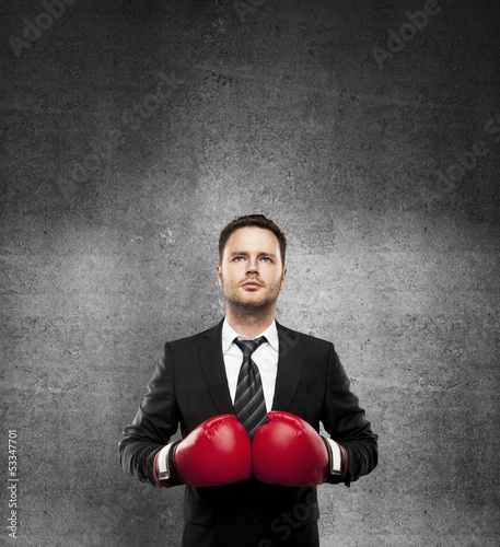 Photo: man in boxing gloves man in boxing gloves