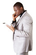 Photo: Handsome businessman working on tablet computer. Handsome businessman working on tablet computer.