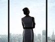 businesswoman standing in office