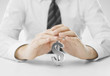 hands covering dollar