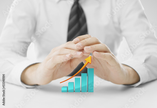 Photo: hands covering chart hands covering chart