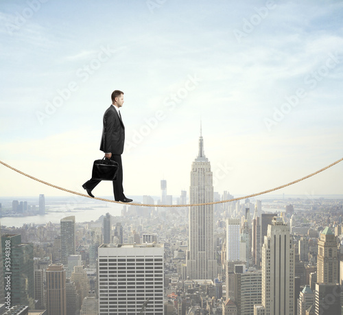 Photo: man walking on a rope man walking on a rope