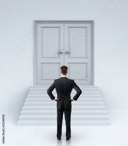 Photo: businessman and doors businessman and doors