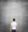 Photo: man standing back man standing back