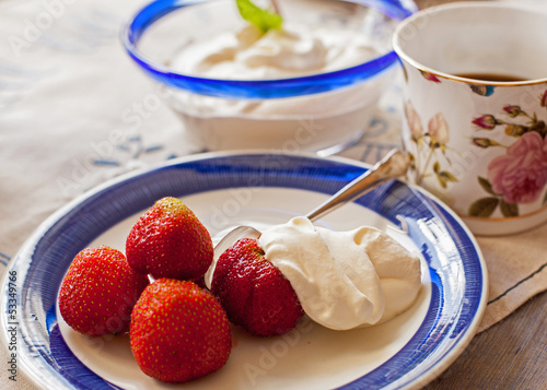 Photo: Dessert with strawberry and cream. Dessert with strawberry and cream.