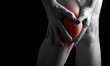 Photo: pain in the knee. Chiropractor doing massage in sick knee in red pain in the knee. Chiropractor doing massage in sick knee in red