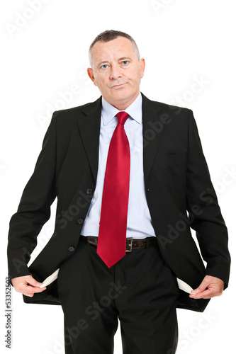 Photo: Poor businessman with empty pockets Poor businessman with empty pockets