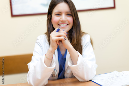 Photo: Female doctor in her studio Female doctor in her studio