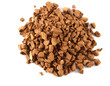 A handful of coarsely ground coffee on a white background
