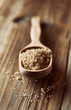 Brown sugar in a wooden spoon
