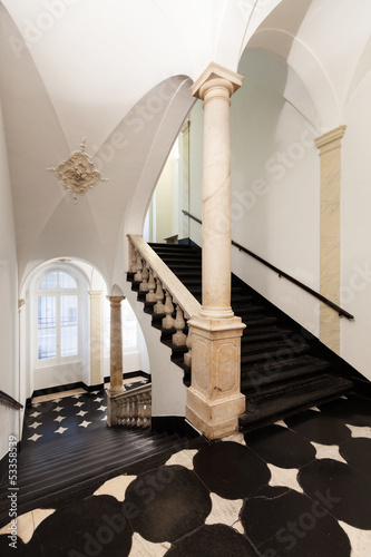 Photo: ancient staircase of a classic historic building, interior ancient staircase of a classic historic building, interior