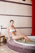 Young woman in the hot tub
