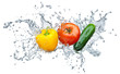 Foto: tomato, cucumber, pepper in spray of water tomato, cucumber, pepper in spray of water