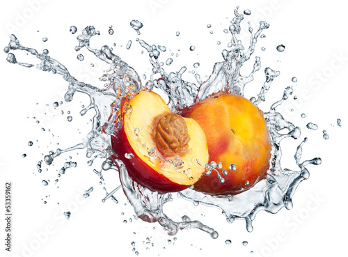 Photo: Peach in spray of water. Peach in spray of water.