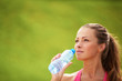 Photo: Woman drinking water from a bottle Woman drinking water from a bottle